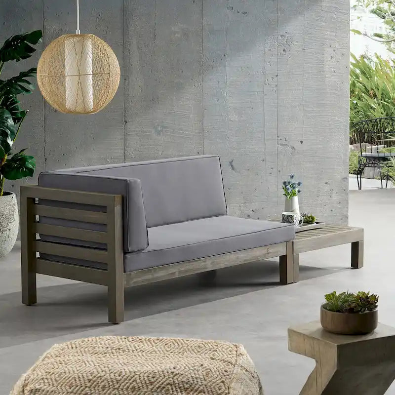 Causeuse d'extérieur Oana en bois d'acacia avec accoudoir gauche et table basse avec coussin par Christopher Knight Home