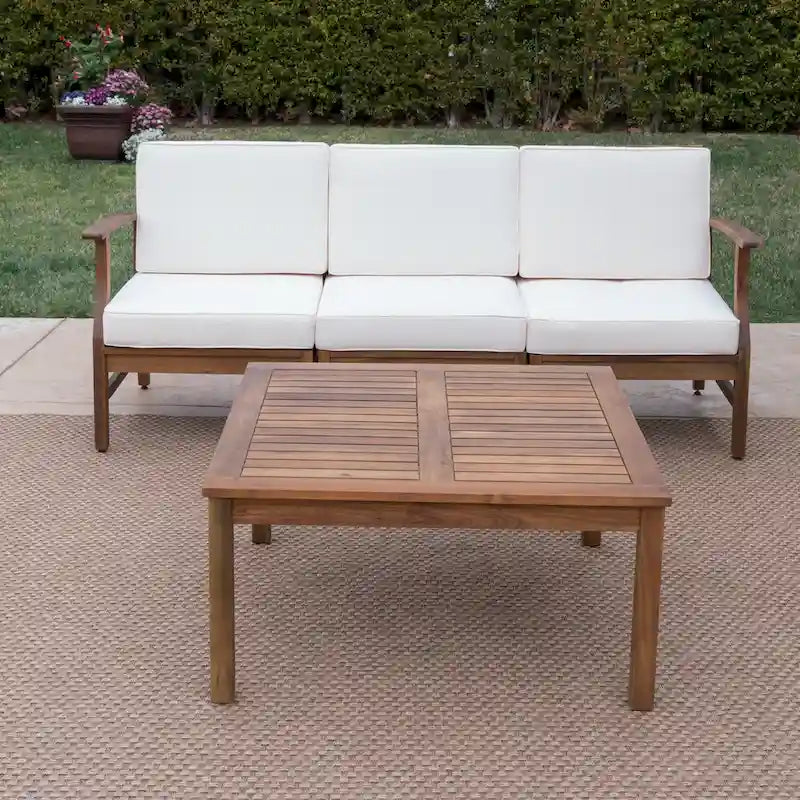 Canapé et table d'extérieur 4 pièces Perla en acacia avec coussins, par Christopher Knight Home