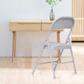 Lot de 4 chaises pliantes avec assise et dossier rembourrés en similicuir PU, structure en métal, capacité de 159 kg, blanches