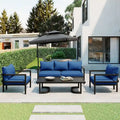 Canapé d'angle d'extérieur en acier 4 places avec table et coussins