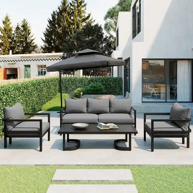 Canapé d'angle d'extérieur en acier 4 places avec table et coussins