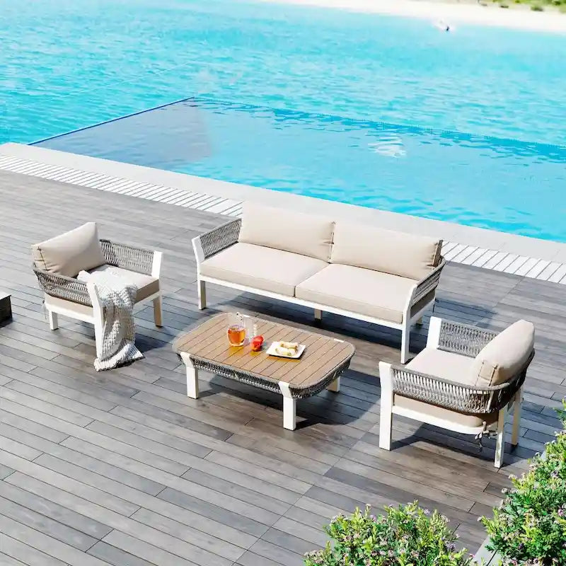 Ensemble de conversation d'extérieur 4 pièces avec table basse et coussins moelleux