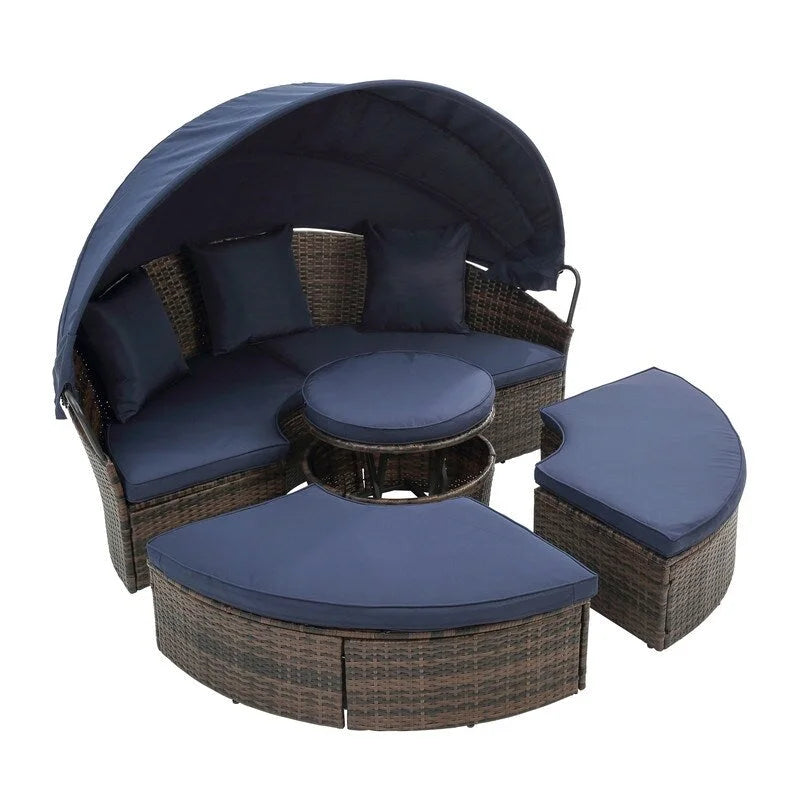 Lit de repos rond d'extérieur en rotin avec auvent, table basse