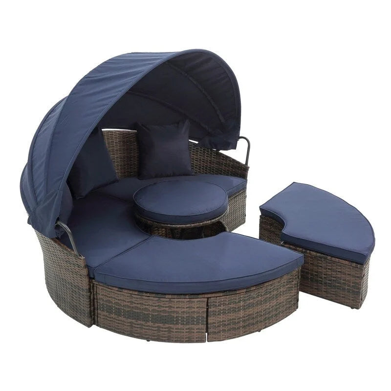 Lit de repos rond d'extérieur en rotin avec auvent, table basse