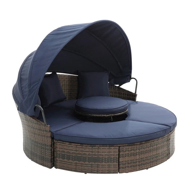 Lit de repos rond d'extérieur en rotin avec auvent, table basse