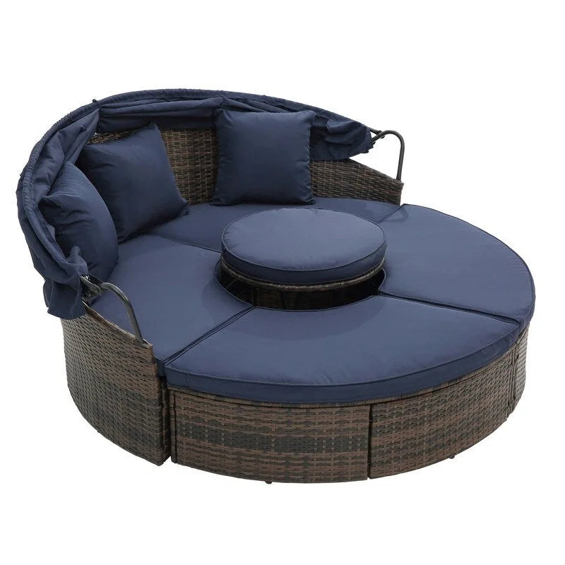 Lit de repos rond d'extérieur en rotin avec auvent, table basse