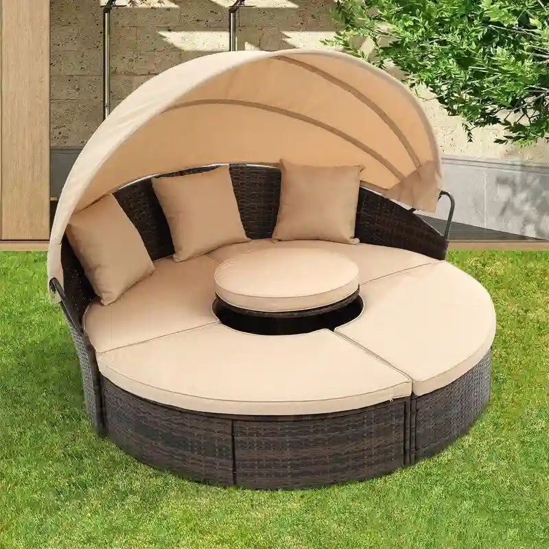 Lit de repos rond d'extérieur en rotin avec auvent, table basse