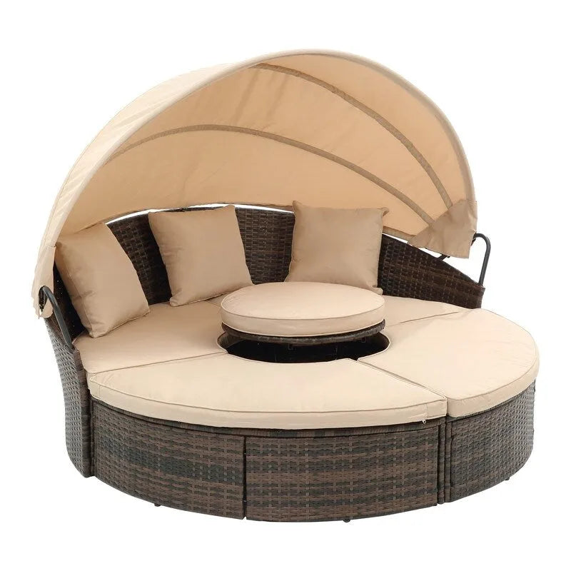 Lit de repos rond d'extérieur en rotin avec auvent, table basse