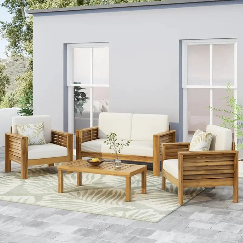 Causeuse et table basse en bois de teck et d'acacia avec coussins crème
